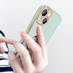 Husă iPhone 15 Plus, antișoc, cu suport în formă de astronaut, verde