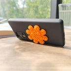 Suport cu ventuze pentru telefon, floare portocalie